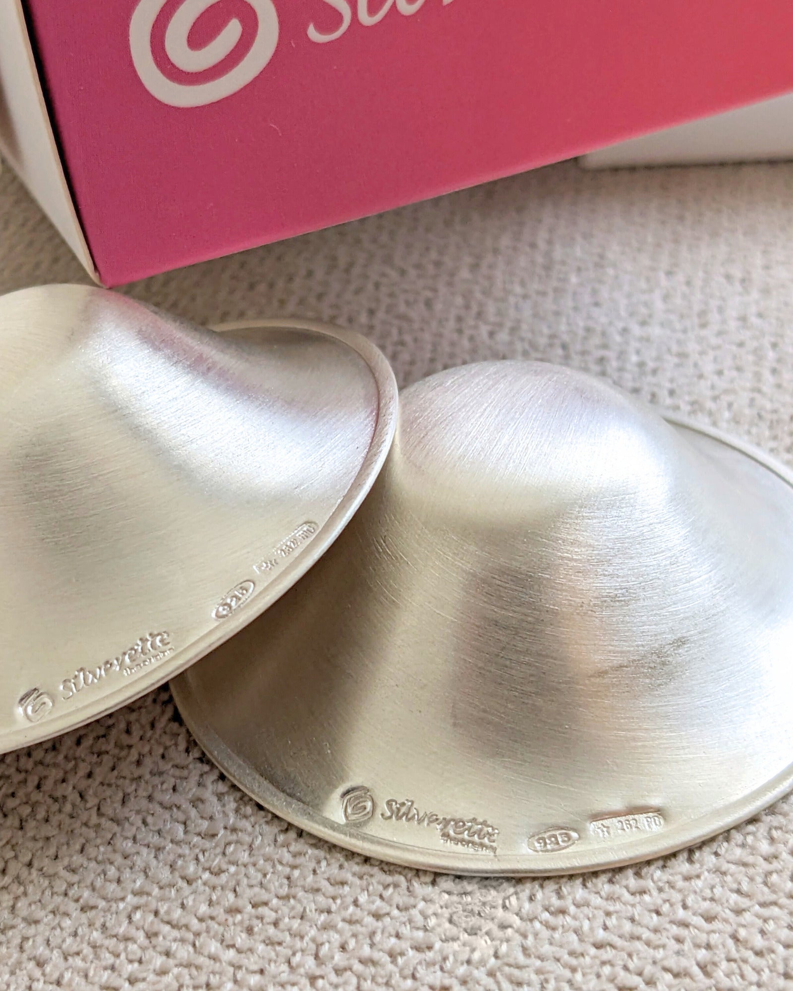 Close-up of Silverette 925 sterling silver nursing cups