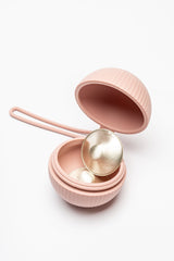Silverette 925 sterling silver nursing cups stored inside the open Happy Nipples pink silicone holder