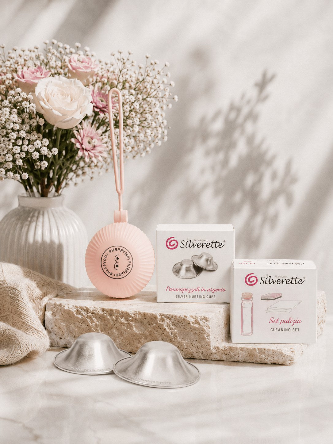 Silverette Starter Set with silver nursing cups and accessories, designed for breastfeeding support and nipple care.