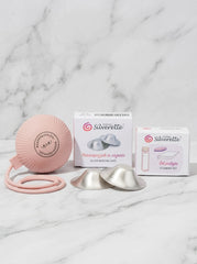 Silverette Starter Set with Silverette breast shells and accessories, shown in a lifestyle setting on a neutral background.